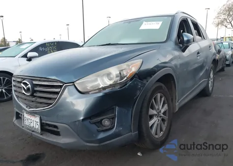 2016 Mazda Cx-5 Touring from USA, damaged, VIN JM3KE4CY9G0631902